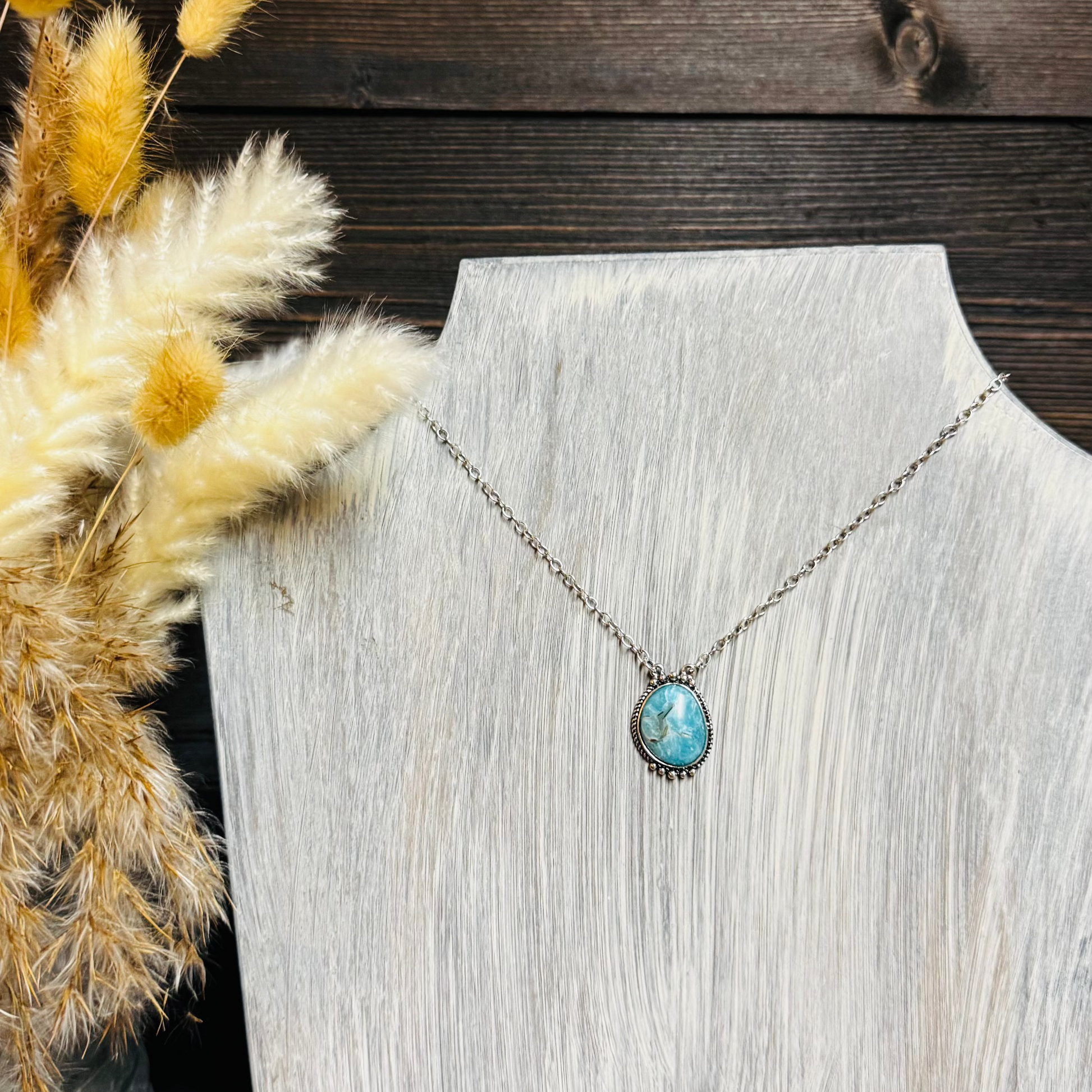 Turquoise Dainty Necklace. Wear this gem alone or layer with other pieces for a bolder look Semi stone 16" length; 3" extender 1" pendant drop Lobster clasp closure