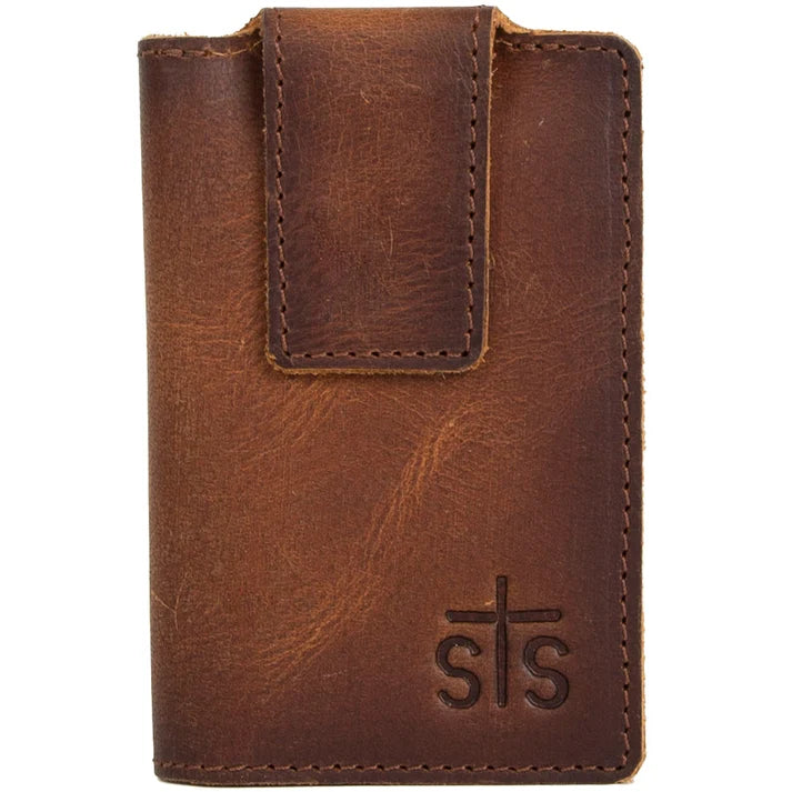 The Tucson Money Clip features full grain leather waxed and oiled to the perfect tan color. This classic rustic look is a must have. Features Genuine full grain leather Money clip ID slot Card pocket Signature STS branded logo 3" W x 4.5"
